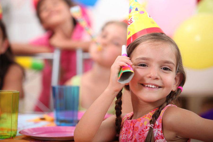 Happy girl at birthday party